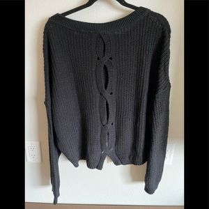 Women’s black sweater from Express back cutouts Size M